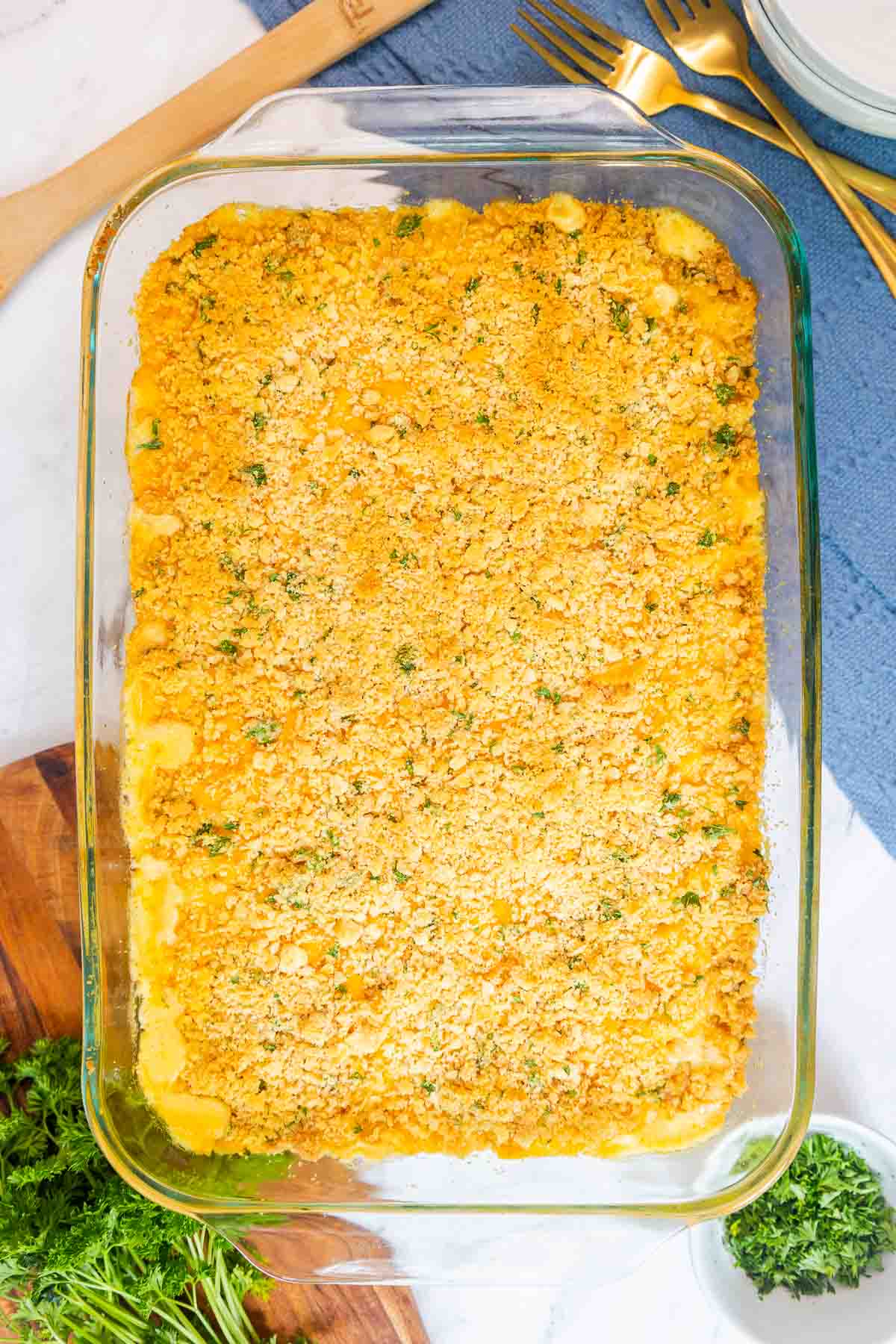 Freshly baked old fashioned mac and cheese with a crisp, golden Ritz cracker crust in a glass baking dish.