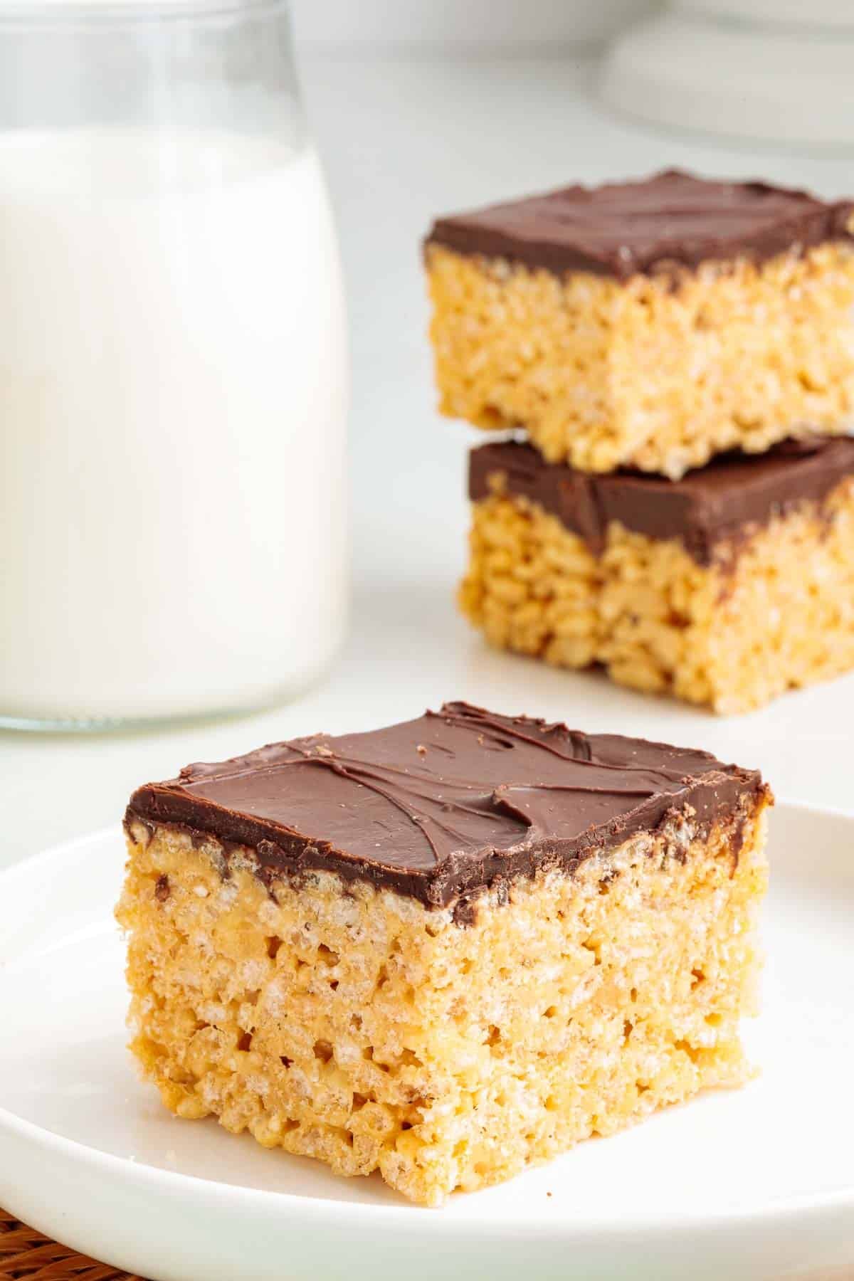 A peanut butter Rice Krispie with a smooth layer of chocolate on top.