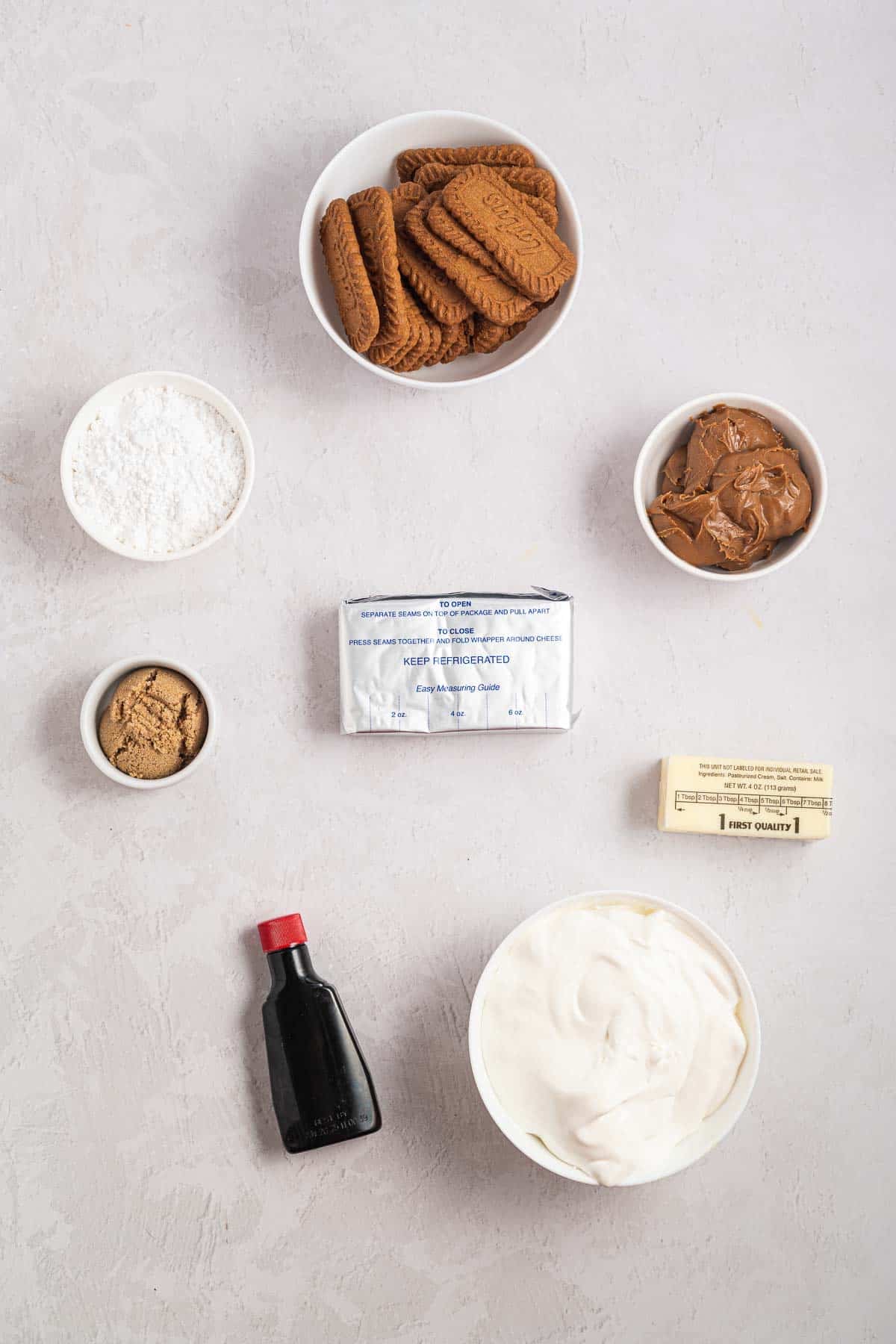 Ingredients for no bake Biscoff cookie butter pie. Biscoff cookies. Powdered sugar. Brown sugar. Cream cheese. Butter. Vanilla extract. Cookie butter. Whipped topping.