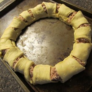 Tuna crescent ring with the crescent rolls folded over.