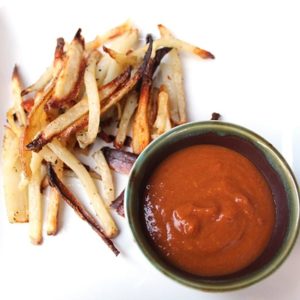 Spicy Peanut Butter Dipping Sauce with french fries.