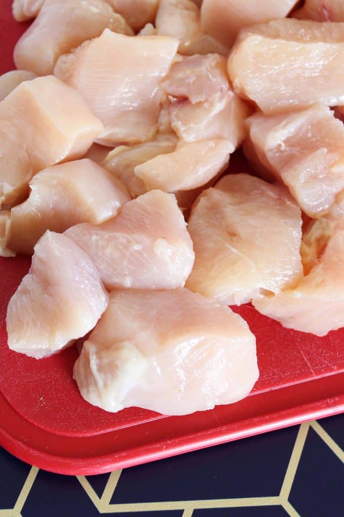 Diced raw chicken breast.