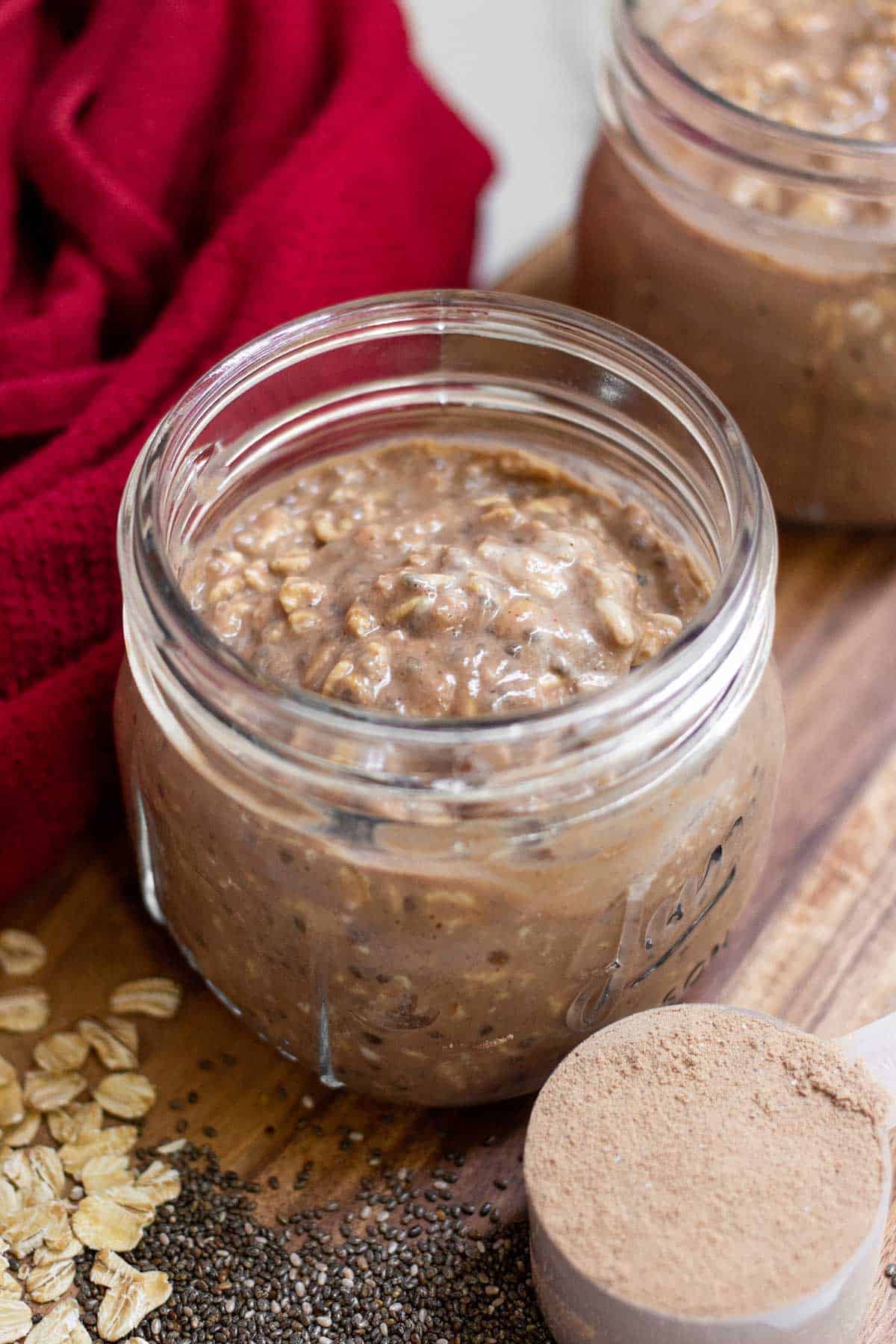 Overnight oats with protein powder in a 12 oz mason jar.