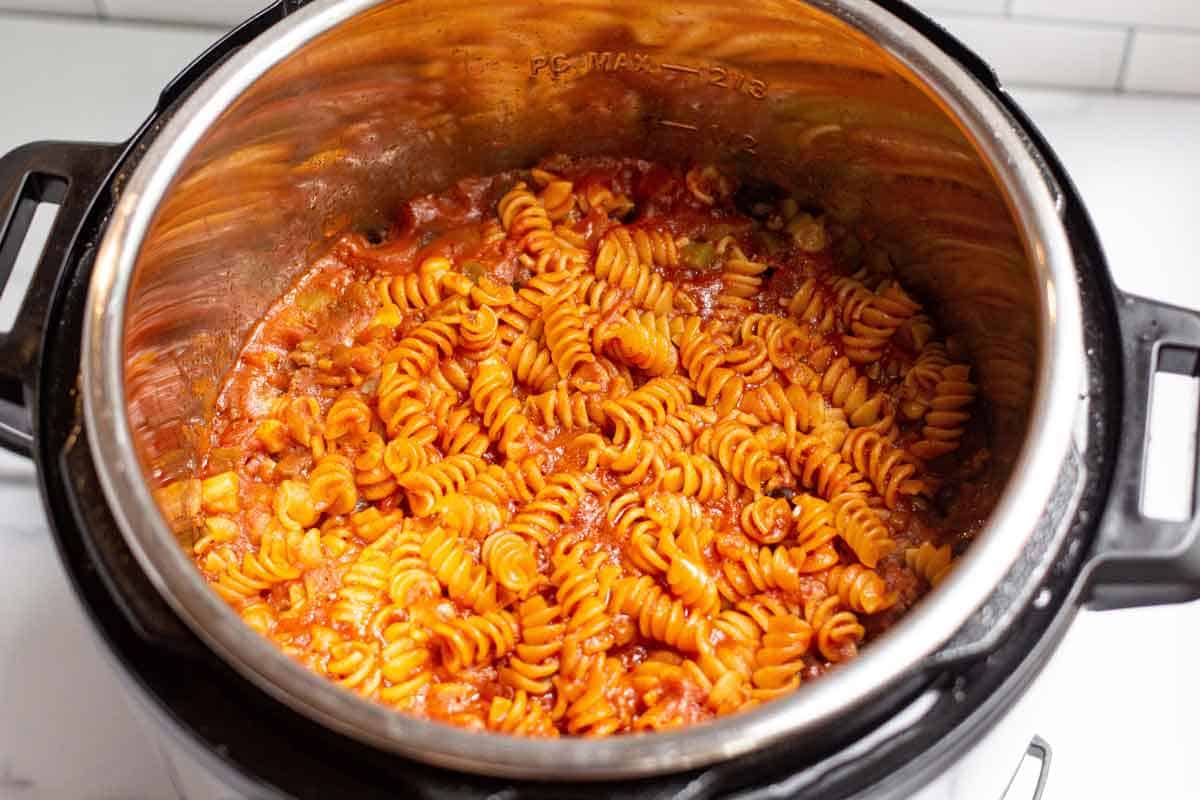 Cooked rotini after a quick release in the pressure cooker.