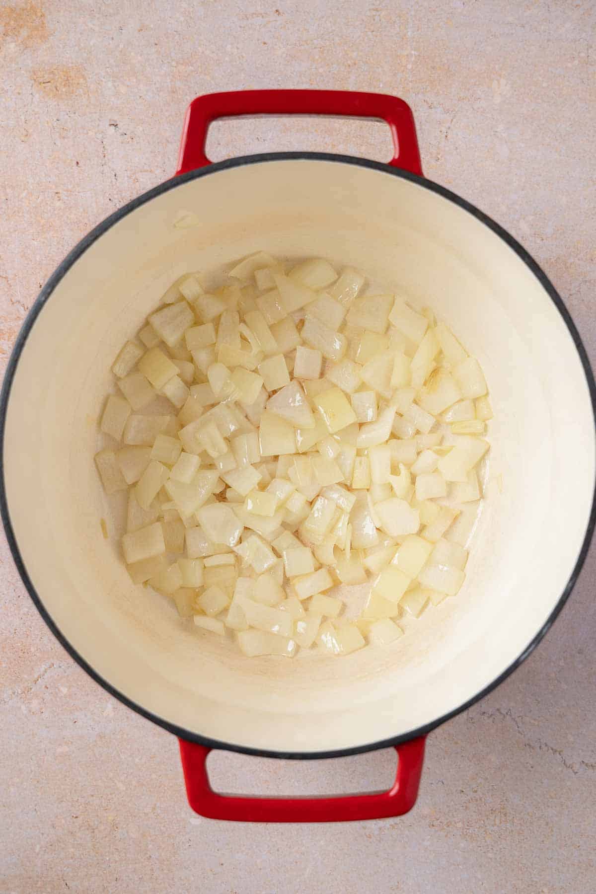 Sautéing diced onion.