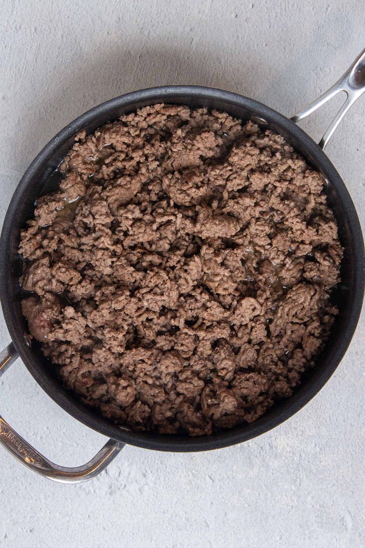 Brown ground beef in a large skillet