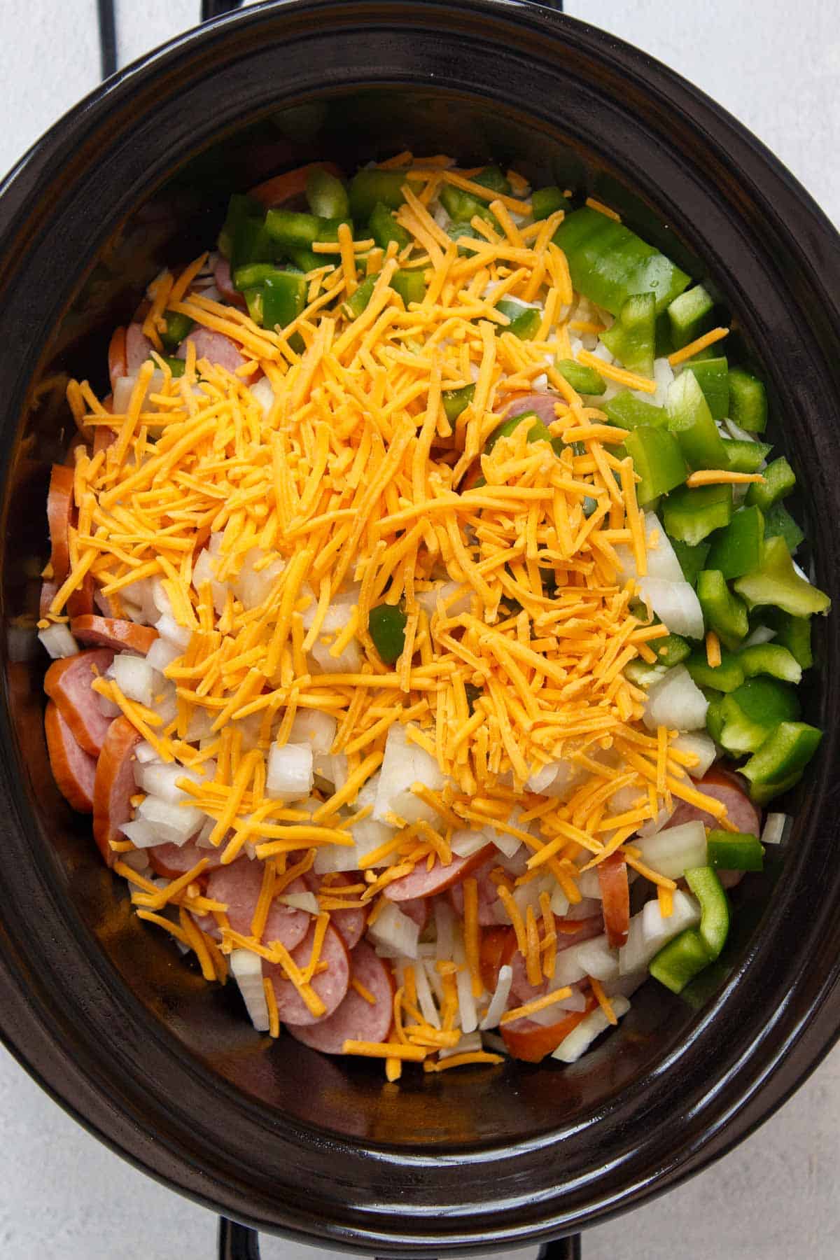 Slow Cooker Cheesy Kielbasa Hash Brown Casserole before cooking