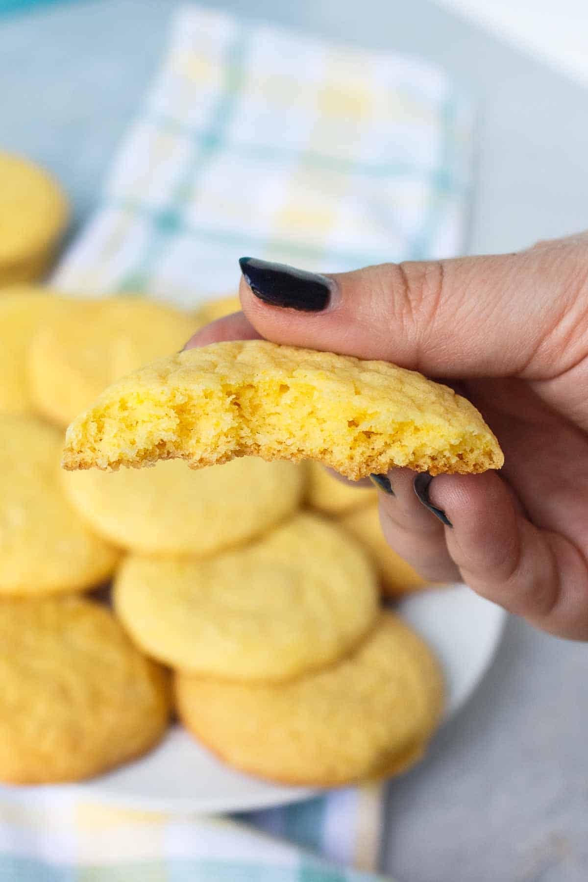 Lemon cookie bit in half to show soft texture