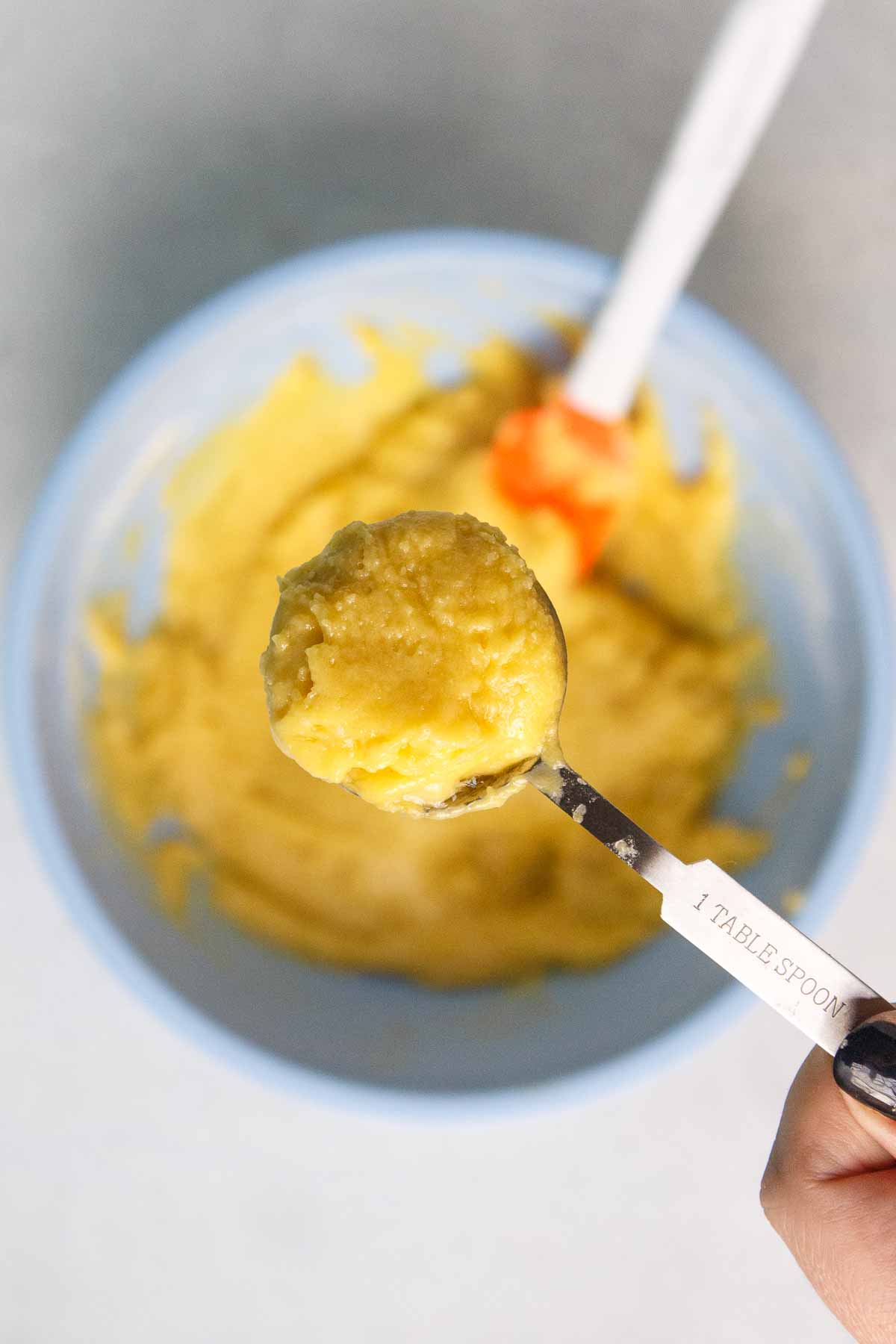 A heaping tablespoon of lemon cookie dough