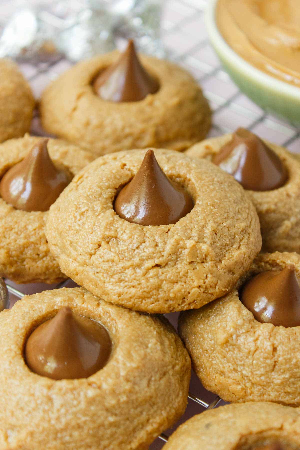 Peanut butter blossoms are peanut butter cookies with a Hershey Kiss pressed into the center.
