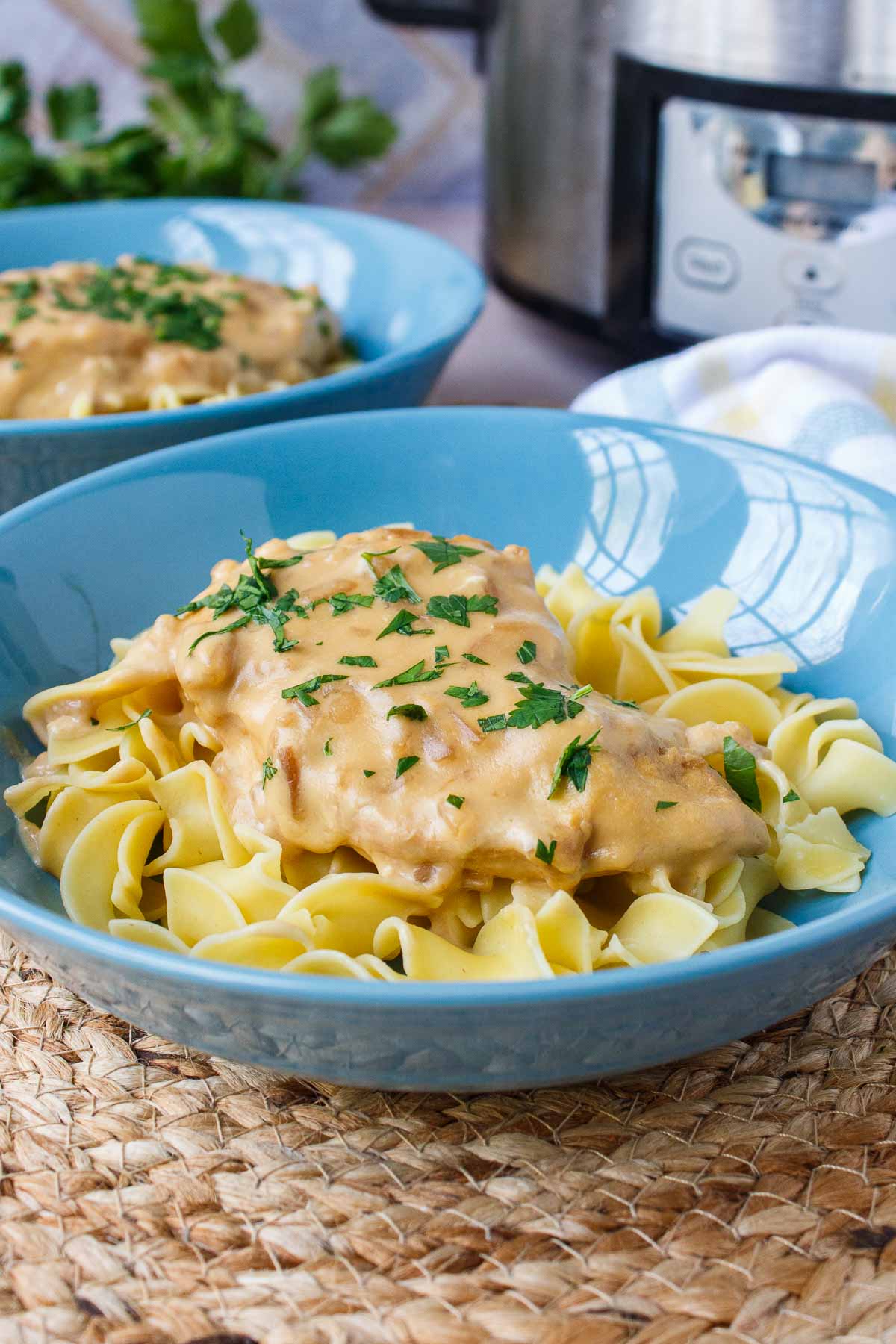 4-Ingredient Crockpot Chicken served on egg noodles