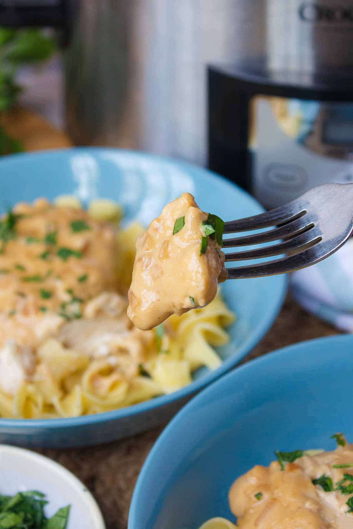 Bite of 4-Ingredient Crockpot Chicken on a fork