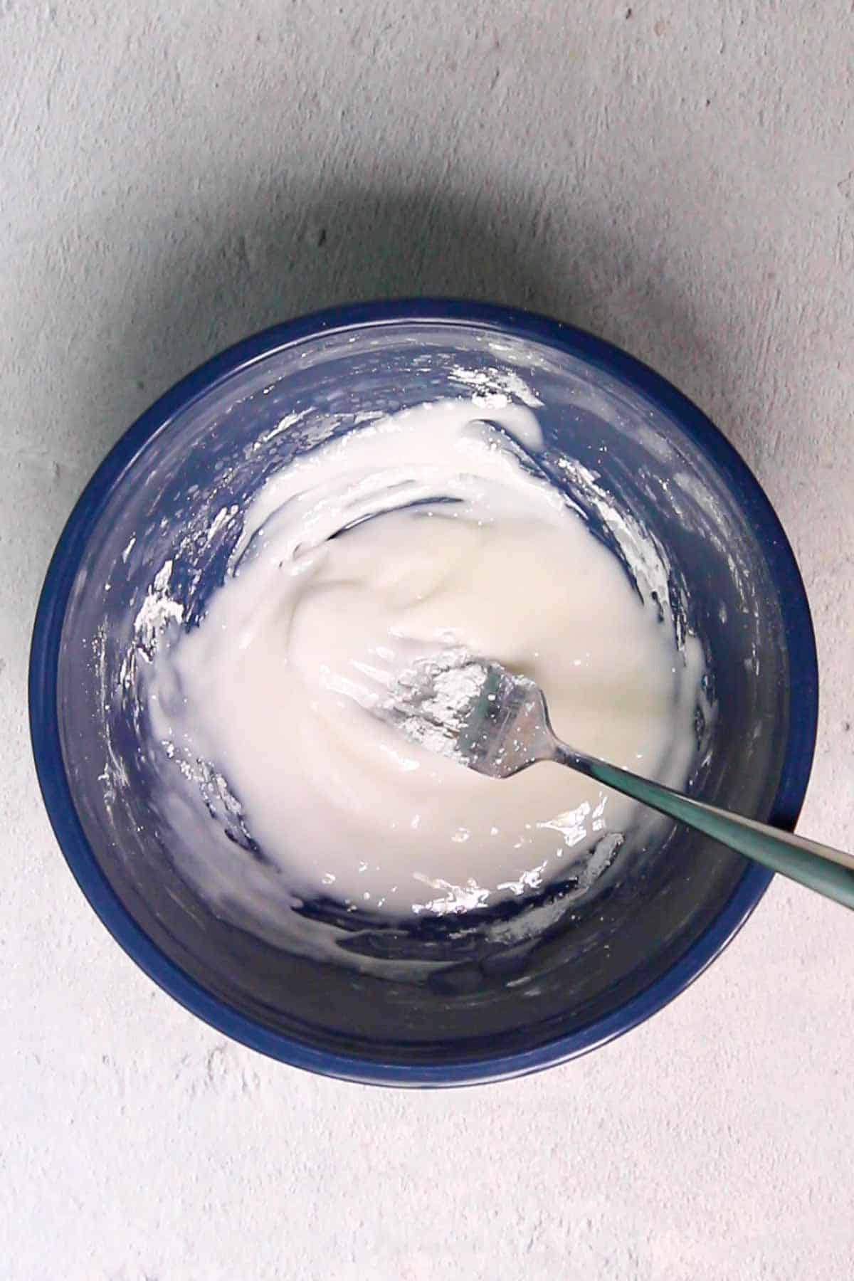 Powdered sugar and lemon juice stirred until combined in a small mixing bowl