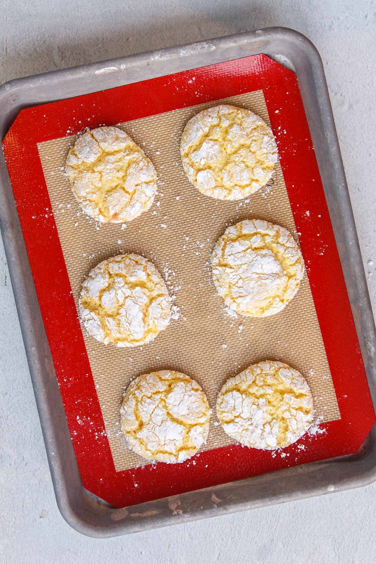 Baked Lemon Cool Whip Cookies on a Baking Sheet