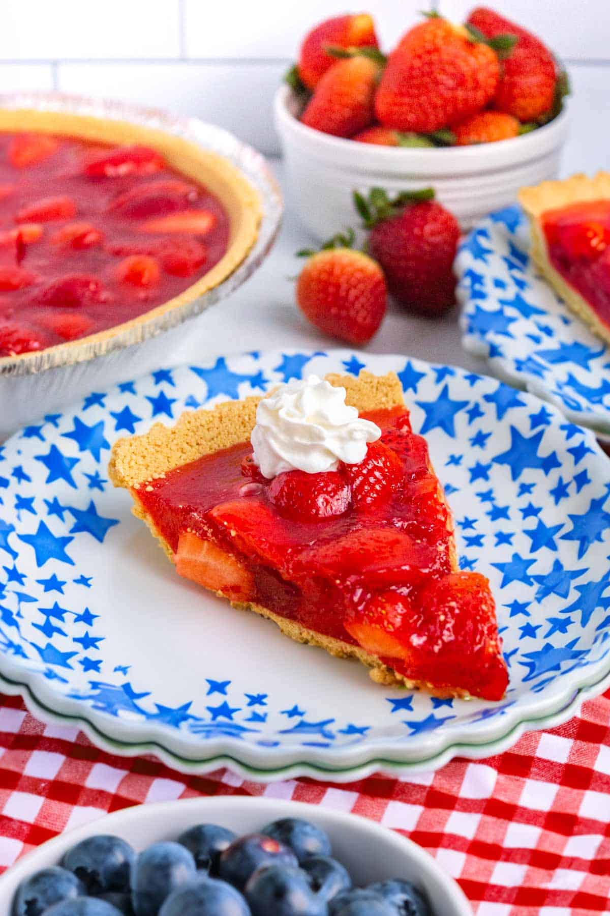 Strawberry Jello Pie slice with whipped cream