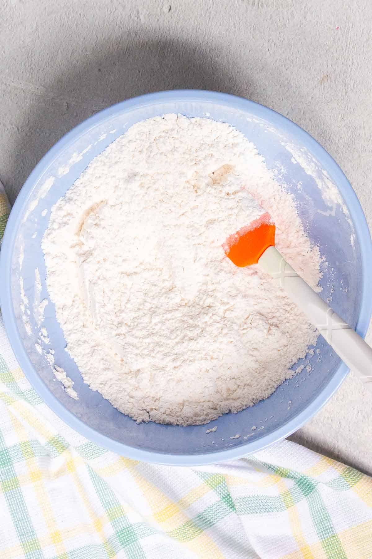 The dry ingredients are mixed together in a medium mixing bowl