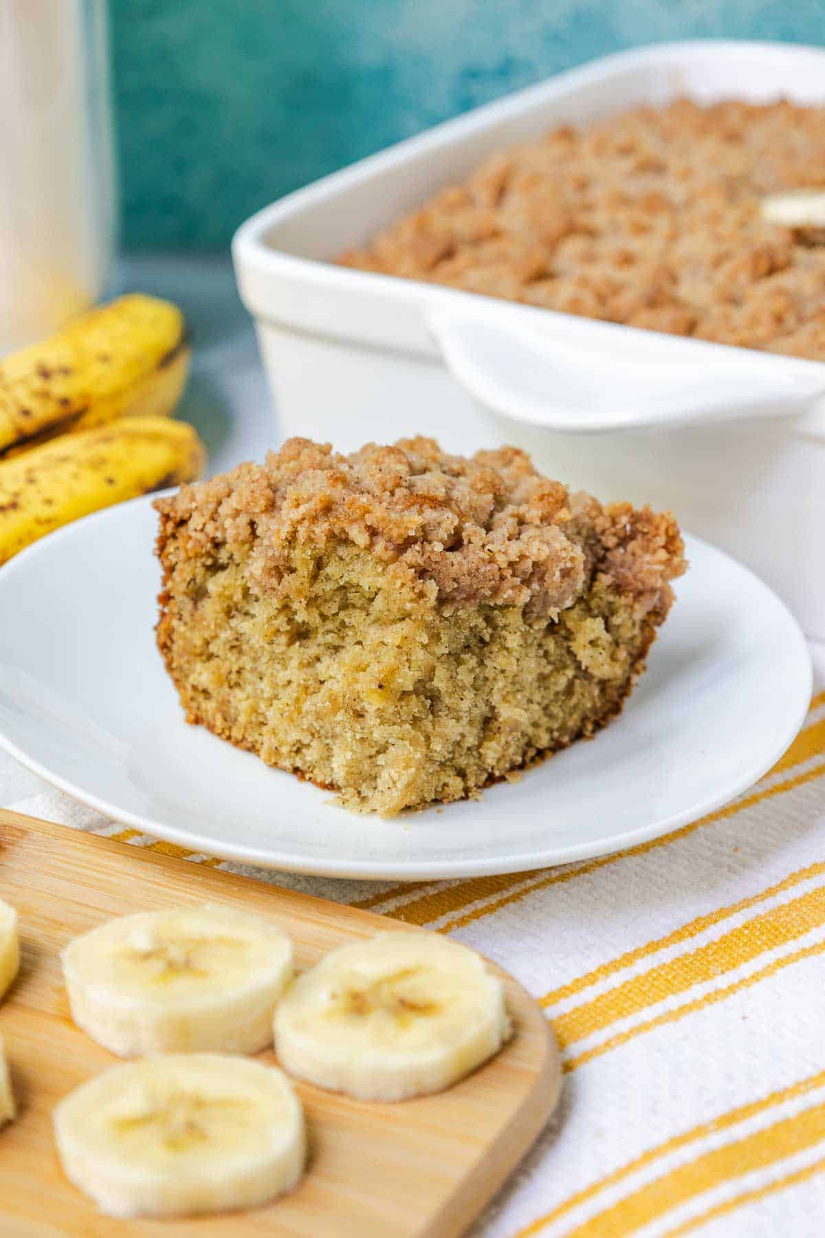 Slice of banana coffee cake with crumble topping