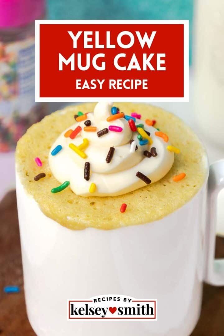 Yellow mug cake topped with buttercream frosting and sprinkles.