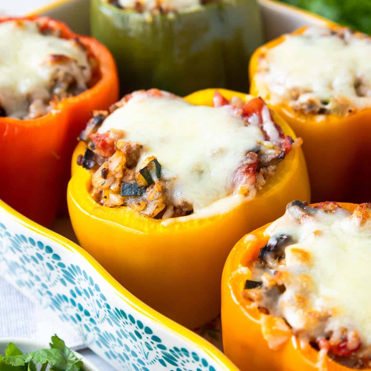 Six whole peppers stuffed with ground turkey, mushrooms, zucchini, tomatoes, and onion.